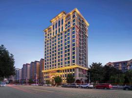 Vienna Hotel Henan Xinyang East Zone of Central Hospital，位于信阳的酒店