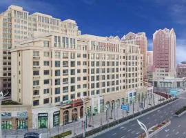 Vienna Hotel Qingdao Oriental Yingdu Sunac Xingguangdao