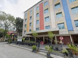 Urbanview Hotel Paramita Pekanbaru by RedDoorz，位于北干巴鲁北干巴鲁机场 - PKU附近的酒店
