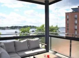Kotimaailma Apartments - saunallinen kaksio järvinäkymällä - Ratina