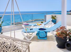 Breathtaking sea view flat for families in Crete，位于克拉托坎波斯的海滩短租房
