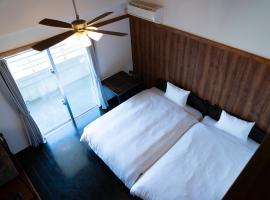 恩納Garden Resort Okinawa 希望が丘ビーチまで徒歩10分，位于Imbu的旅馆