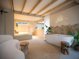 Ontspan huisje: wellness in de natuur，位于拉纳肯的海滩酒店