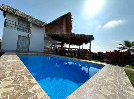 Galia Chincha® Casa de Playa con Piscina 1era fila，位于Casa Blanca的酒店