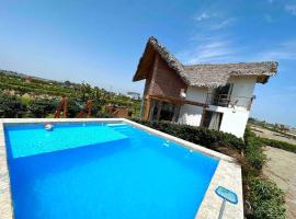 OASIS CHINCHA Casa de playa con Piscina 1era fila，位于Casa Blanca的度假屋