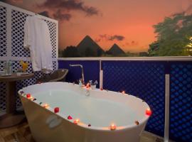Turquoise Pyramids & Grand Egyptian museum view Hotel