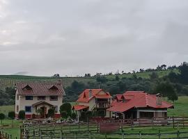 Refugio de Montaña Huerta Sacha，位于Chaupi的山林小屋