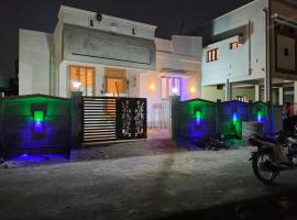 Thirunallar Ganesha's HomeStay，位于卡来卡的酒店