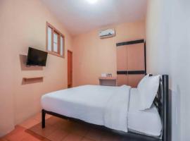 Kelapa Dua Guesthouse，位于Klapadua的酒店