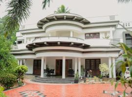 Marari Sailor Homestay，位于Shertallai的酒店