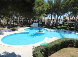Apartamento Playa Xoriguer con piscina y jardin