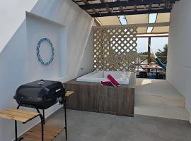 Villa con alberca, a una cuadra del mar，位于希克苏鲁伯的酒店