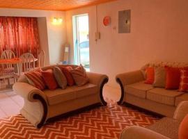 Lovely 2 bedroom condo with WiFi in a quiet area, 7-10 minutes away from both the airport and Oistins