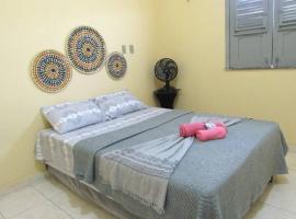 Casa praiana - agradável e confortável ambiente com ar-condicionado，位于巴纳伊巴的公寓