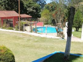 Chácara, 3 suítes, piscina, lago, wi-fi 250 mbps，位于瓜鲁柳斯的乡村别墅