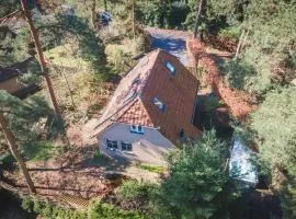 Wellnesshuis met jacuzzi en sauna in het bos