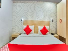 OYO Happy Inn，位于新德里亚穆纳综合体育馆附近的酒店
