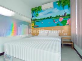 Joy Homestay Near UMJ Jember Mitra RedDoorz，位于任抹的酒店