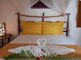 Bungalow atypique Ti Mabouya à 500m de la plage，位于圣安尼的酒店