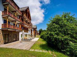 Pohorje Village Wellbeing Resort - Forest Hotel Videc，位于霍茨科波霍尔耶的酒店