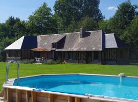 Ndila Cottage avec piscine exclusive，位于Fatouville-Grestain的度假屋