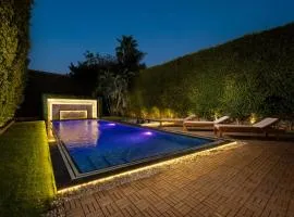 Zyra villa with pool and waterfall in New Cairo