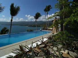碧高海兰得海滩别墅度假酒店，位于波尔多·格尼拉的度假村