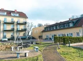 Appartement in Rheinsberg mit Garten und Seeblickbalkon