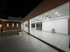 Casa patio / Cabaña / Piscina，位于里奥阿查的酒店