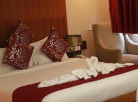Hotel The Amaris，位于瑞诗凯诗Dehradun Airport - DED附近的酒店