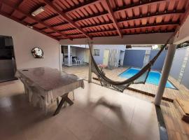 Casa agradável e aconchegante com piscina，位于帕尔马斯的酒店