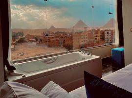 Pharaonic Pyramids Inn，位于开罗吉萨的酒店