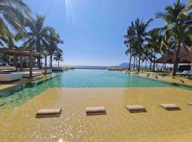 Bonito departamento pie de playa en el mejor condominio de manzanillo, Ponto Horizonte. Hermosa vista, hasta para 8 personas. Ambiente familiar.，位于曼萨尼约的酒店