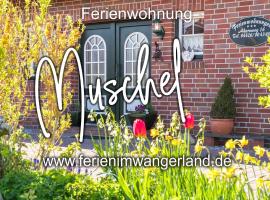 Ferien im Wangerland Ferienwohnung MUSCHEL Minsen Schillig Hund Pool Sauna，位于旺格兰的酒店