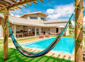 Casa NOVA com PISCINA CLIMATIZADA, churrasqueira e vista MONTANHAS - 20Km de Bragança - PET FRIENDLY，位于Tuiuti的带泳池的酒店