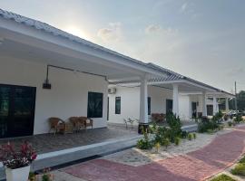 Ocean Cottage 1, Radiant Teluk Sari，位于Kampung Mawar的木屋