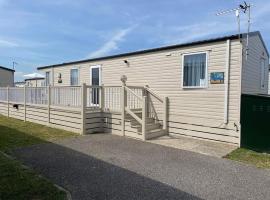 49 Bayside Cove Pevensey Bay Holiday Park，位于佩文西的木屋