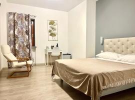 Bella Vita Guesthouse -parcheggio privato interno，位于阿罗纳的酒店