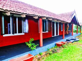 Agastya Lake View Coorg Homestay，位于Ponnampet的酒店