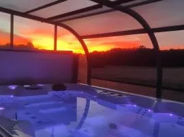 gite mille et une bulles avec jacuzzi couvert et privatisé 24 h/24 h