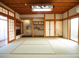 Kanwa Heart House KIX，位于贝冢市的酒店