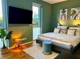 LITELIVING Cozy Suite - Sauna - Balkon - Parken - BBQ - Modern & Gemütlich，位于默讷塞的酒店