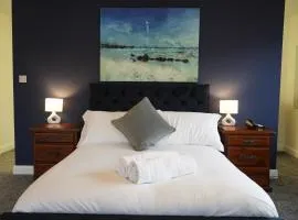 8 double beds in a 5 bedroom house, pets welcome