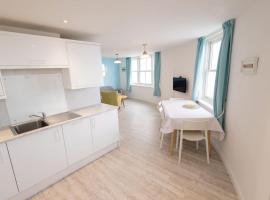 Beachside Gallery Flat Weymouth，位于韦茅斯的酒店