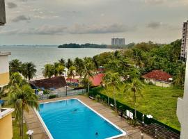 Seaview PD Teluk Kemang Homestay，位于波德申的带泳池的酒店