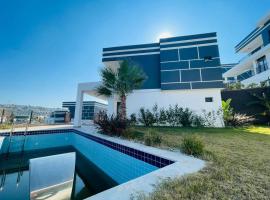 Luxury Villa with private Pool，位于库萨达斯的酒店