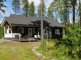 Hochwertiges Ferienhaus mit Sauna sowie Holzterrasse und Garten am See