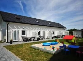 Gemütliches Ferienhaus in Grzybowo mit Garten, Terrasse und Grill - b53705