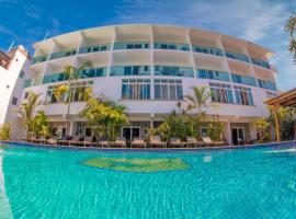 Hotel Rega Suites Guayabitos - Family & Kitchen，位于瓜亚比托斯的酒店