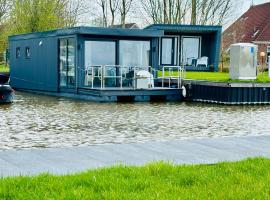 Uniek overnachten in een Tiny House op de Appelhof，位于Wommels的小屋